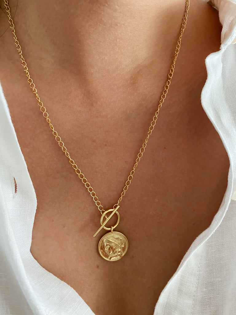 Roman necklace best sale pendant