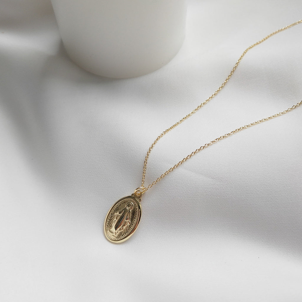 Oval coin necklace top